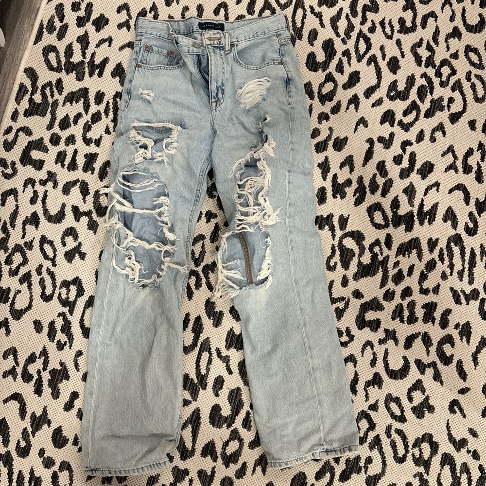 Distressed Light Blue Denim Jeans